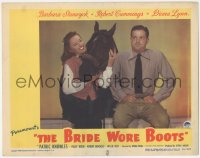8k0818 BRIDE WORE BOOTS LC 1946 Robert Cummings is mad that Barbara Stanwyck likes horse better!