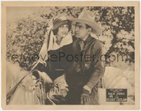 8k0862 DESERT OUTLAW LC 1924 great romantic close up of Buck Jones & pretty Evelyn Brent on horse!