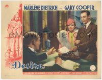 8k0864 DESIRE LC 1936 man at desk hands note to sexy jewel thief Marlene Dietrich & Gary Cooper!