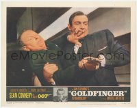 8k0929 GOLDFINGER LC #5 1964 c/u of Sean Connery as James Bond wrestling gun from Gert Frobe!
