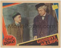 8k0936 GOODBYE MR. CHIPS LC 1939 Robert Donat tells young boy his father was a late student too!