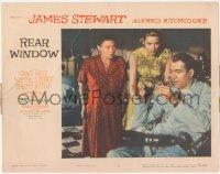 8k1145 REAR WINDOW LC #7 1954 Hitchcock, Thelma Ritter & Grace Kelly look at excited James Stewart!