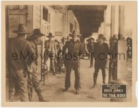 8k1247 TRAIL RIDER LC 1925 lots of suspicious men eye Buck Jones as he walks through town, rare!