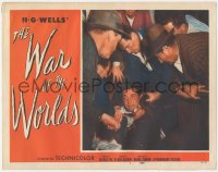 8k0539 WAR OF THE WORLDS LC #1 1953 men help wounded Gene Barry get up off the ground, classic!