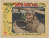 8k1293 WINGS LC 1928 great c/u of pilot Richard Arlen smiling in his airplane, continuous release!