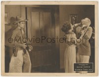 8k1294 WINNER TAKE ALL LC 1924 Buck Jones pointing gun as Peggy Shaw defends herself from bad guy!