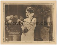 8k1303 WORLD'S APPLAUSE LC 1923 close up of worried Bebe Daniels holding phone to her ear!