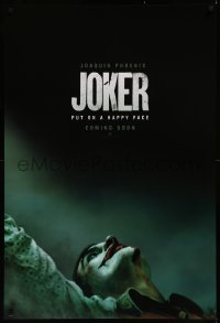 8p0978 JOKER int'l teaser DS 1sh 2019 close-up image of clown Joaquin Phoenix, put on a happy face!
