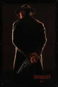 8p1269 UNFORGIVEN teaser DS 1sh 1992 image of gunslinger Clint Eastwood w/back turned, dated design!