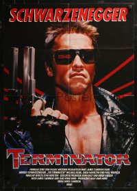 8w0252 TERMINATOR German 1985 close up of most classic cyborg Arnold Schwarzenegger with gun!