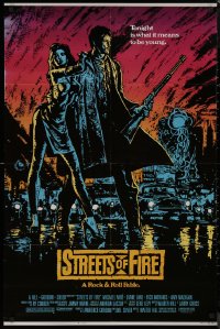 8w1239 STREETS OF FIRE 1sh 1984 Walter Hill, Michael Pare, Diane Lane, artwork by Riehm, w/ borders!