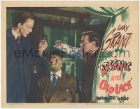 8z0638 ARSENIC & OLD LACE LC 1944 Peter Lorre & Raymond Massey toast over bound & gagged Cary Grant!