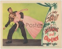 8z0640 ARSENIC & OLD LACE LC 1944 c/u of scared Cary Grant carrying Priscilla Lane, Frank Capra