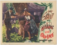 8z0644 ARSENIC & OLD LACE LC 1944 Cary Grant pulling scared Priscilla Lane by tree, Capra classic!