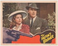 8z1026 FALCON'S BROTHER LC 1942 close portrait of Tom Conway & Jane Randolph, cool gun border art!