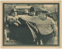 8z1184 LONESOME LUCK LC 1923 c/u of cowboy Jack Dougherty as Happy Jack Morgan punching bad guy!