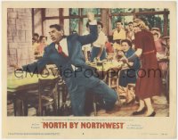 8z0658 NORTH BY NORTHWEST LC #8 1959 Alfred Hitchcock, Eva Marie Saint shoots at Cary Grant in cafe!