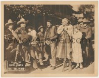 8z1436 TRAIL RIDER LC 1925 townsfolk watch Buck Jones carry wounded woman on street!