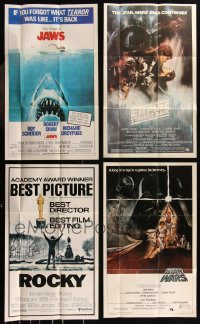9a0662 LOT OF 4 FOLDED 12X20 TOPPS POSTERS 1981 Jaws, Empire Strikes Back, Star Wars, Rocky!