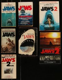 9a0489 LOT OF 7 JAWS SERIES SOFTCOVER AND HARDCOVER BOOKS 1970s-2010s Peter Benchley's shark horror!