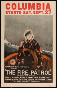9b0294 FIRE PATROL WC 1924 great art of scared Anna Q. Nilsson at wheel of ship at sea!