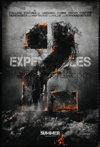 9f0816 EXPENDABLES 2 teaser DS 1sh 2012 image of tough-guy Sylvester Stallone in blown-up wall!