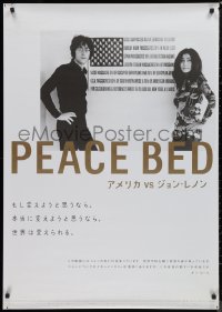 9f0374 U.S. VS. JOHN LENNON Japanese 29x41 2007 John & Yoko Ono, image in front of genocide poster!