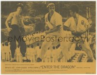 9g0163 ENTER THE DRAGON synopsis sheet 1973 different image of Bruce Lee w/ Jim Kelly & John Saxon!