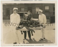 9j1493 SPEEDY 8.25x10.25 still 1928 Harold Lloyd with paramedics carrying Ann Christy & luggage!