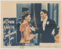 9j0742 GENTLEMAN JIM LC 1942 pretty Alexis Smith stands in front of boxer Errol Flynn in tuxedo!