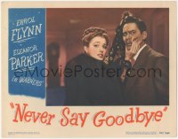 9j0845 NEVER SAY GOODBYE LC 1946 pretty Eleanor Parker in fur coat squeezes Errol Flynn's face!