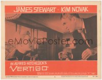 9j0984 VERTIGO LC #8 1958 Alfred Hitchcock, standing James Stewart glares at blonde Kim Novak!