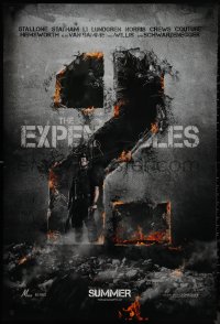 9k0741 EXPENDABLES 2 teaser DS 1sh 2012 image of tough-guy Sylvester Stallone in blown-up wall!