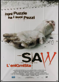 9p1619 SAW Italian 2p 2004 gruesome close up image of severed arm, every puzzle has its pieces!
