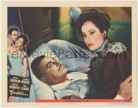 9p1293 TEMPTATION LC #5 1946 c/u of Merle Oberon looking away from George Brent laying in bed1!