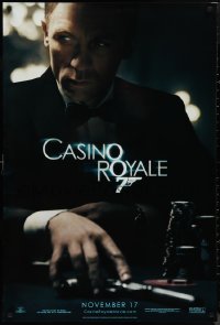 9r1097 CASINO ROYALE teaser DS 1sh 2006 Craig as James Bond sitting at poker table w/gun!