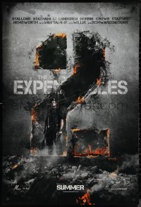 9r1137 EXPENDABLES 2 teaser DS 1sh 2012 image of tough-guy Sylvester Stallone in blown-up wall!