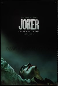 9r1235 JOKER teaser DS 1sh 2019 close-up image of clown Joaquin Phoenix, put on a happy face!