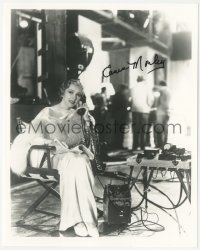 9s1295 KAREN MORLEY signed 8x10 REPRO still 1980s great candid using telephone on a movie set!