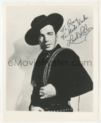 9s1299 LASH LA RUE signed 8x10 REPRO photo 1980s cowboy portrait with his whip on his shoulder!
