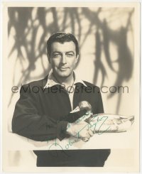 9s1139 ROBERT TAYLOR signed deluxe 8x10 still 1950s great portrait by fence with a wooden duck!