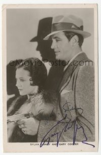 9s0651 GARY COOPER/SYLVIA SIDNEY signed English postcard 1931 by BOTH, c/u with gun in City Streets!