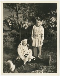 9t0991 THEM THAR HILLS 8x10.25 still 1934 Stan Laurel stares at dirty Oliver Hardy on ground, rare!