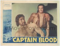 9t0321 CAPTAIN BLOOD LC 1935 Michael Curtiz swashbuckler classic, close up of two huge guys!