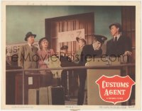9t0332 CUSTOMS AGENT LC #3 1950 Marjorie Reynolds watches officer searching William Eythe's luggage!