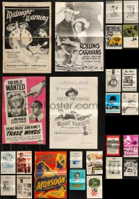 9x0491 LOT OF 25 UNCUT PRESSBOOKS 1930s-1960s advertising for a variety of different movies!