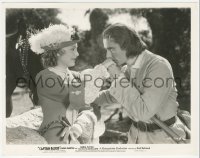 9y1139 CAPTAIN BLOOD 8x10.25 still 1935 c/u of Errol Flynn kissing Olivia De Havilland's hand!