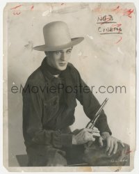 9y1356 VIRGINIAN 8x10 still 1929 great seated portrait of super young cowboy Gary Cooper with gun!