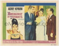 9y0574 BREAKFAST AT TIFFANY'S LC #5 1961 elegant Audrey Hepburn between Peppard & Balsam at party!