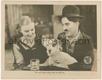 9y0718 DOG'S LIFE LC 1918 close up of Charlie Chaplin telling Edna Purviance she will love his dog!